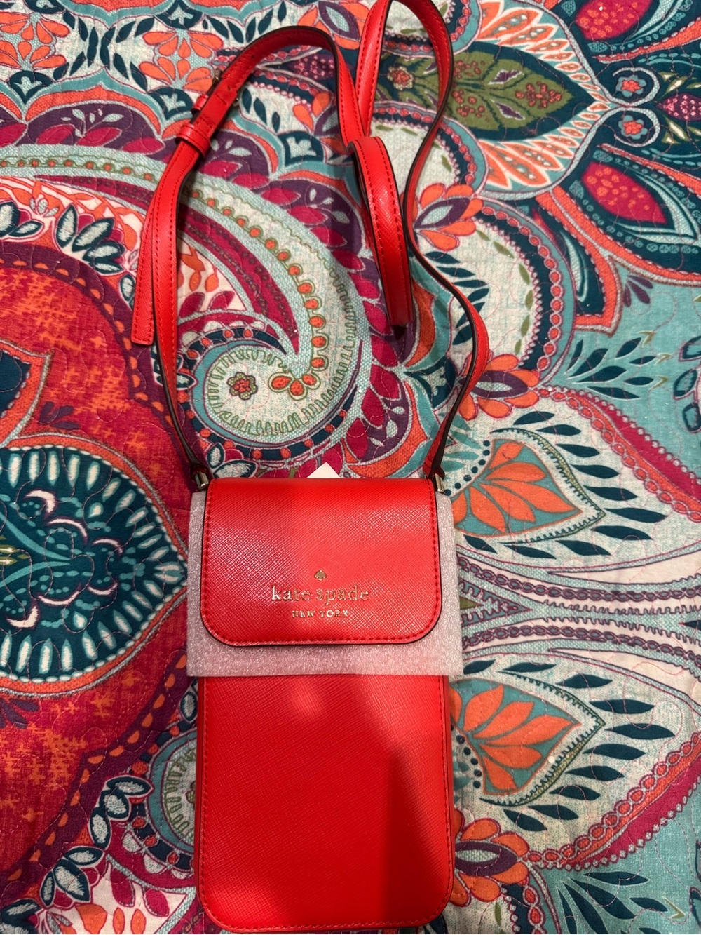 kate spade red crossbody phone pouch with glitter flap
